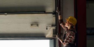 do i need to have my garage door serviced regularly