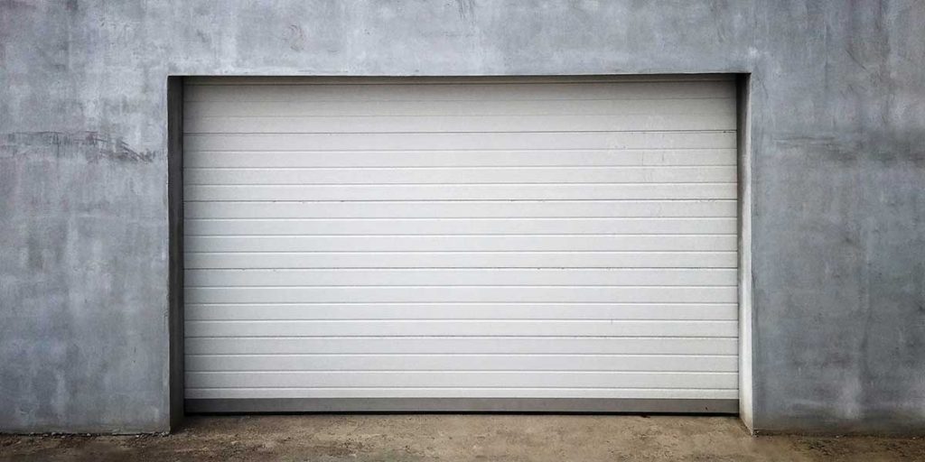 garage door makes grinding noise when fully closed